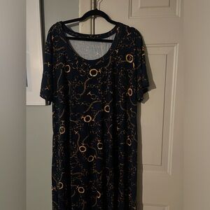 Cute pattern dress. Never worn.
